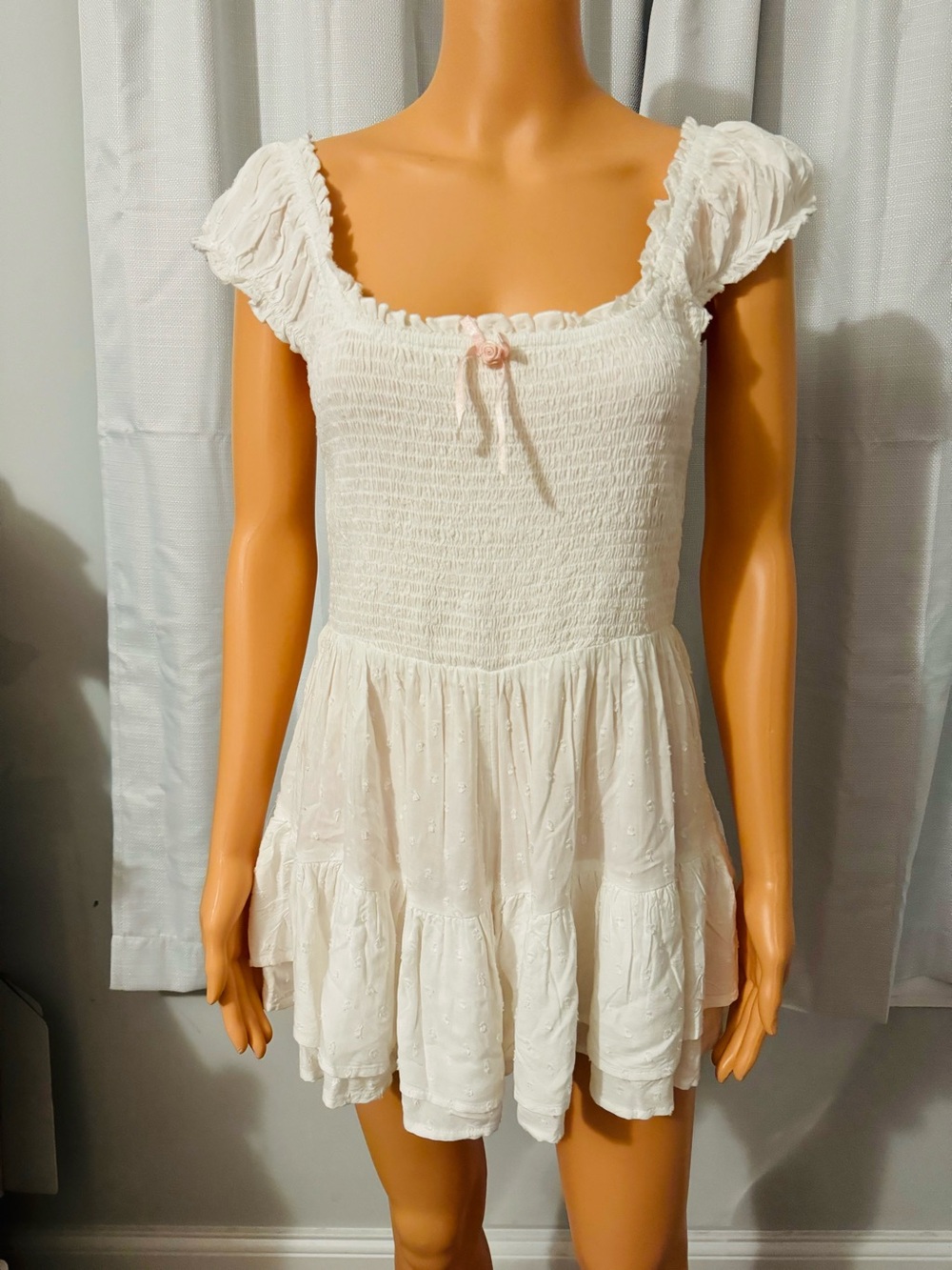 Adorable Kimchi Blue size M white smocked short sleeve shorts romper dress new